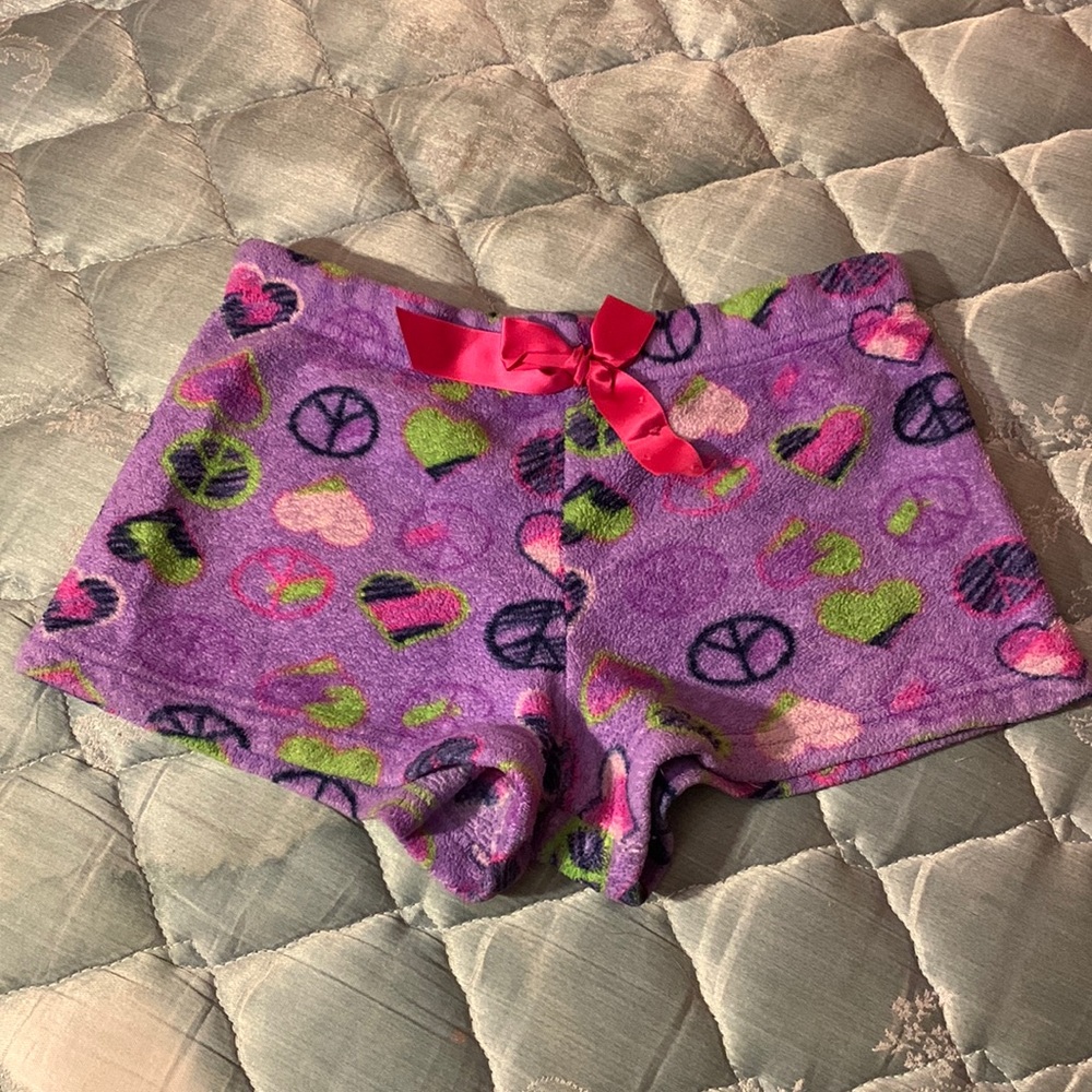 Small, Purple pajama shorts with pink bow, peace sign and hearts design